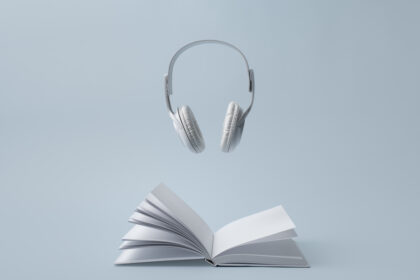book and headphones